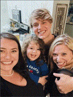 Lisa Meeks (on right) with friends and family